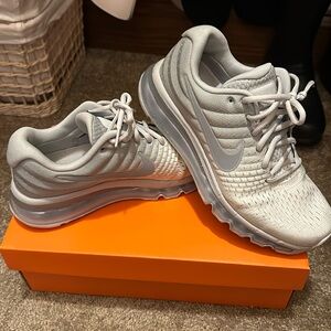 Women’s Nike Air Max tennis shoes.